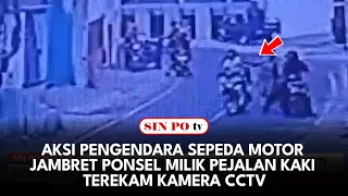 Aksi Pengendara Sepeda Motor Jambret Ponsel Milik Pejalan Kaki Terekam Kamera CCTV