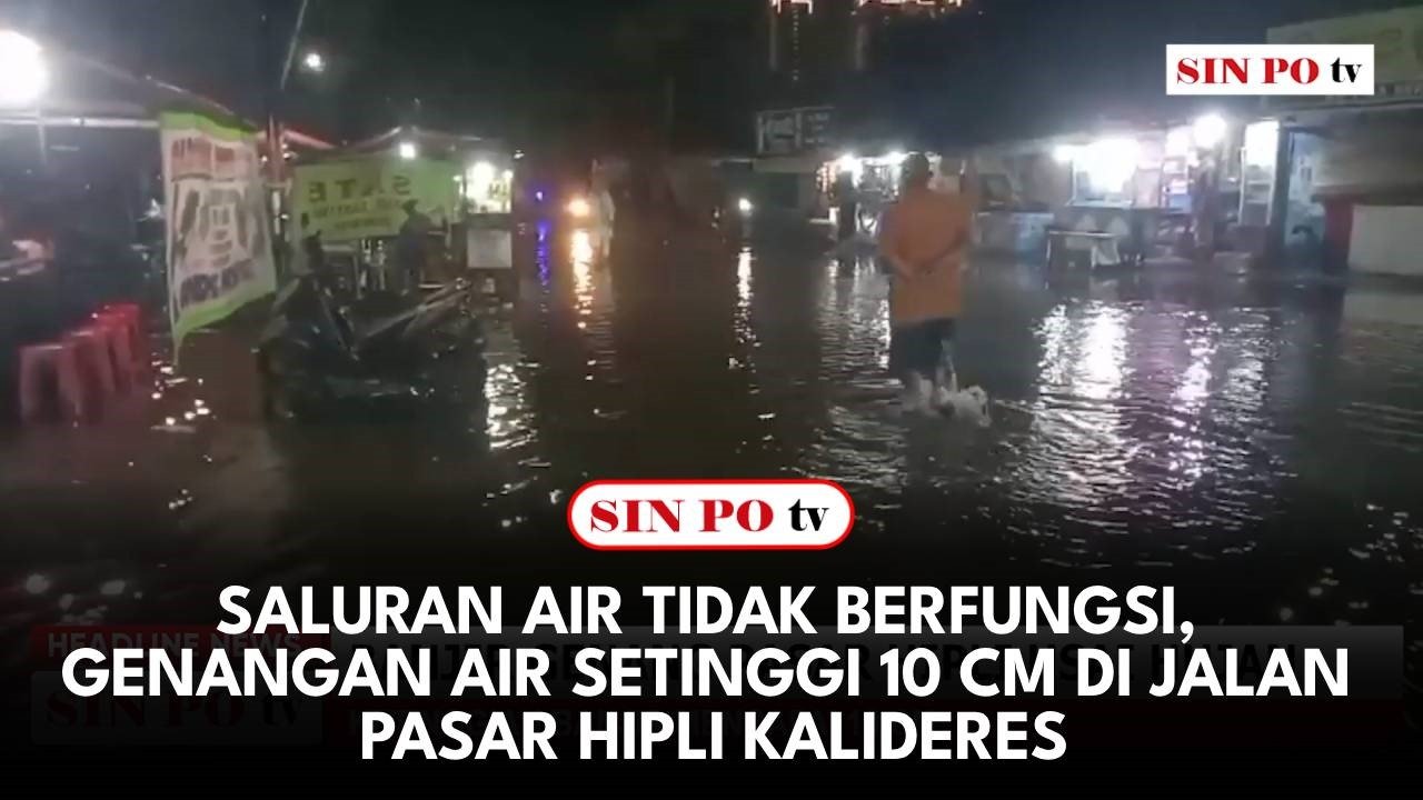 Saluran Air Tidak Berfungsi, Genangan Air Setinggi 10 Cm Di Jalan Pasar Hipli Kalideres