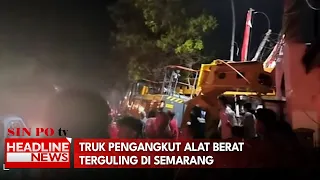 Truk Pengangkut Alat Berat Terguling Di Semarang