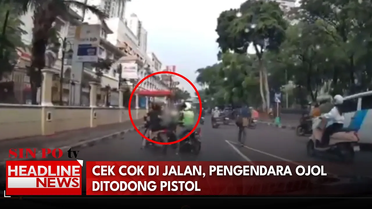 Cek Cok Di Jalan, Pengendara Ojol Ditodong Pistol 1