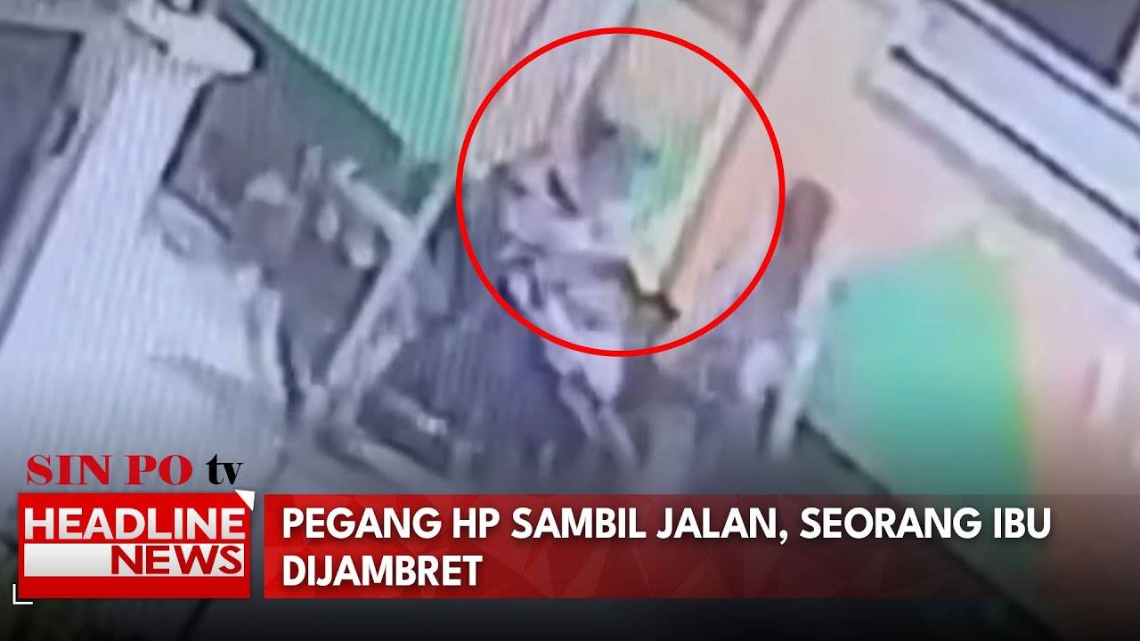 Pegang HP Sambil Jalan, Seorang Ibu Dijambret