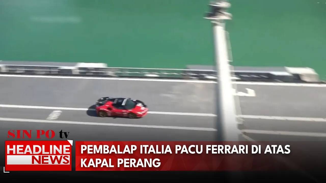 Pembalap Italia Pacu Ferrari Di Atas Kapal Perang