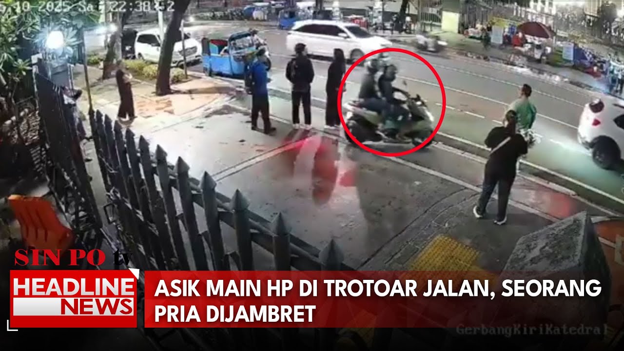 Asik Main HP di Trotoar Jalan, Seorang Pria Dijambret