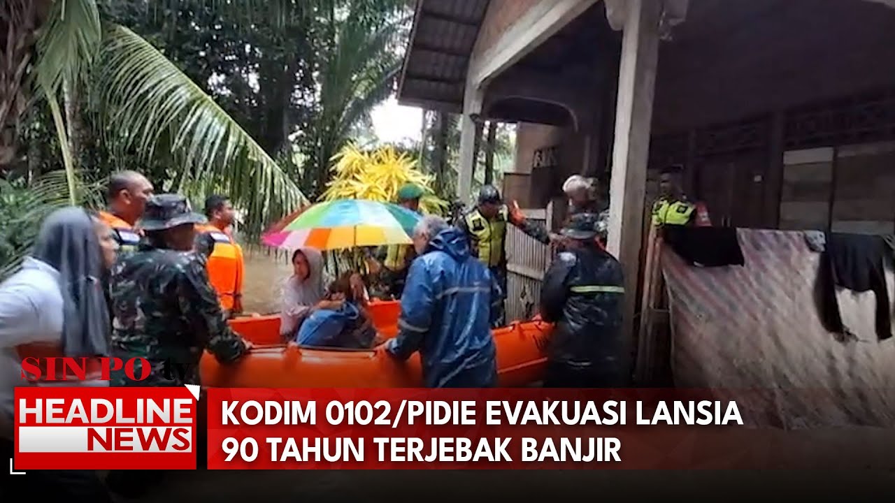 Kodim 0102/Pidie Evakuasi Lansia 90 Tahun Terjebak Banjir