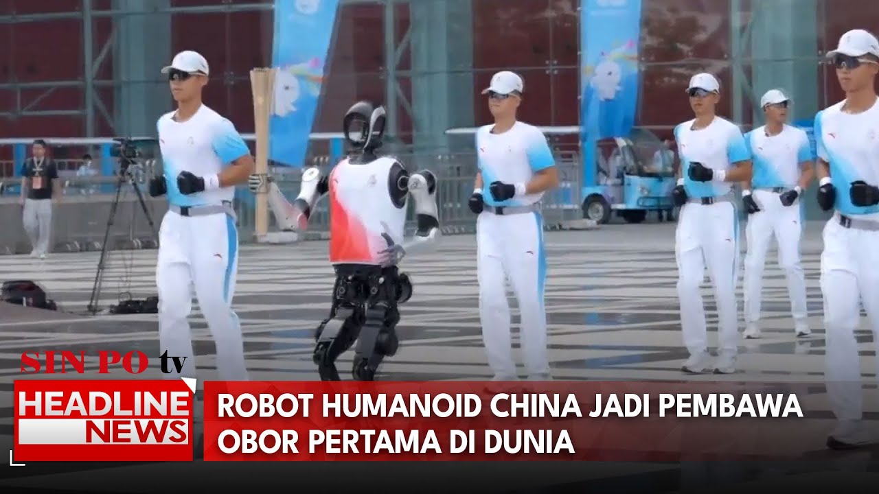 Robot Humanoid China Jadi Pembawa Obor Pertama Di Dunia
