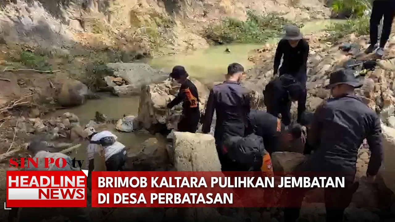 Brimob Kaltara Pulihkan Jembatan di Desa Perbatasan
