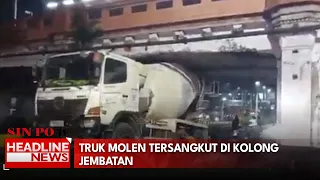 Truk Molen Tersangkut Di Kolong Jembatan