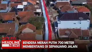 Bendera Merah Putih 700 Meter Membentang di Sepanjang Jalan