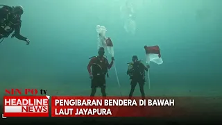 Pengibaran Bendera di Bawah Laut Jayapura