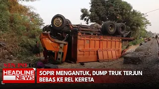 Sopir Mengantuk, Dump Truk Terjun Bebas Ke Rel Kereta