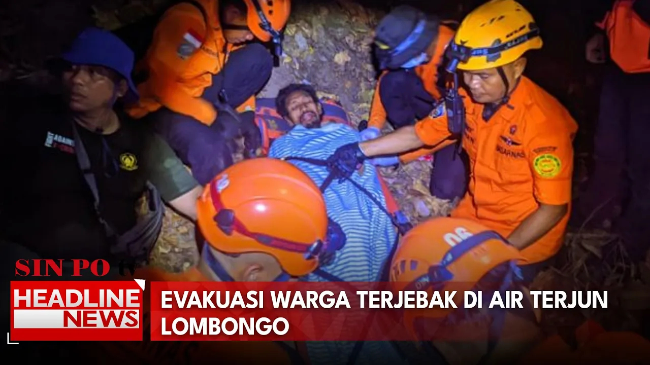 Evakuasi Warga Terjebak di Air Terjun Lombongo
