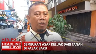 Semburan Asap Keluar Dari Tanah di Pasar Baru